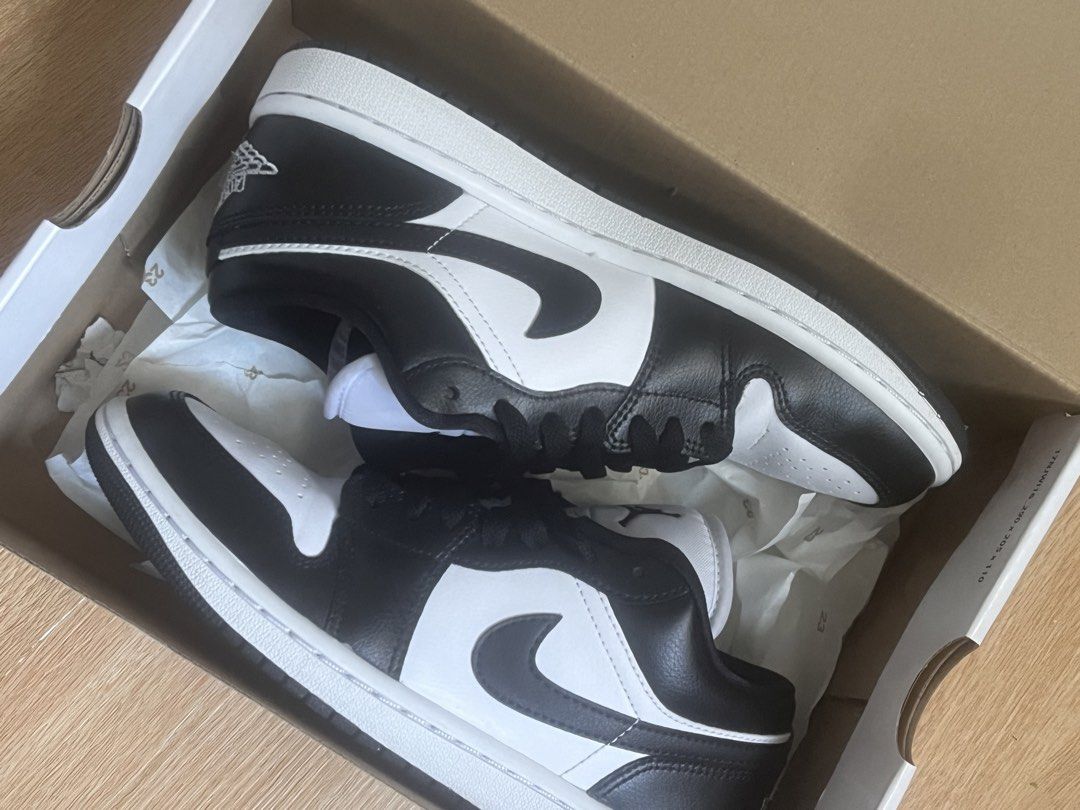 Air Jordan 1 Low Black White Panda (Category: Sneakers) located in Pasig City. Submitted by sellthings99 (Listing ID 1440770786, Image 1). Description: - Classic black and white Air Jordan 1 Lows - Iconic silhouette - Great for everyday wear - Comes with original box - A must-have for any sneaker collection.