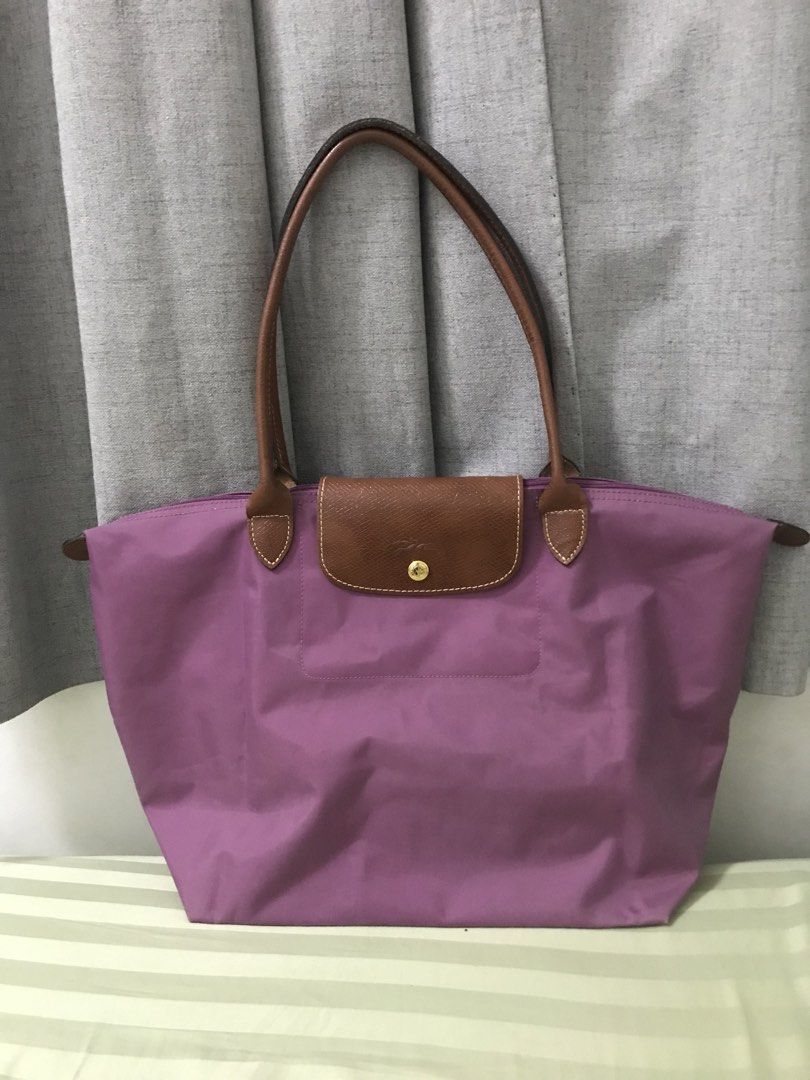 Auth Long Champ Japan (Category: Luxury Bags & Wallets) located in Manila. Submitted by freshlemon58885 (Listing ID 1440844049, Image 1). Description: Sign of usage Japan Minor rubs corners No Bubble.