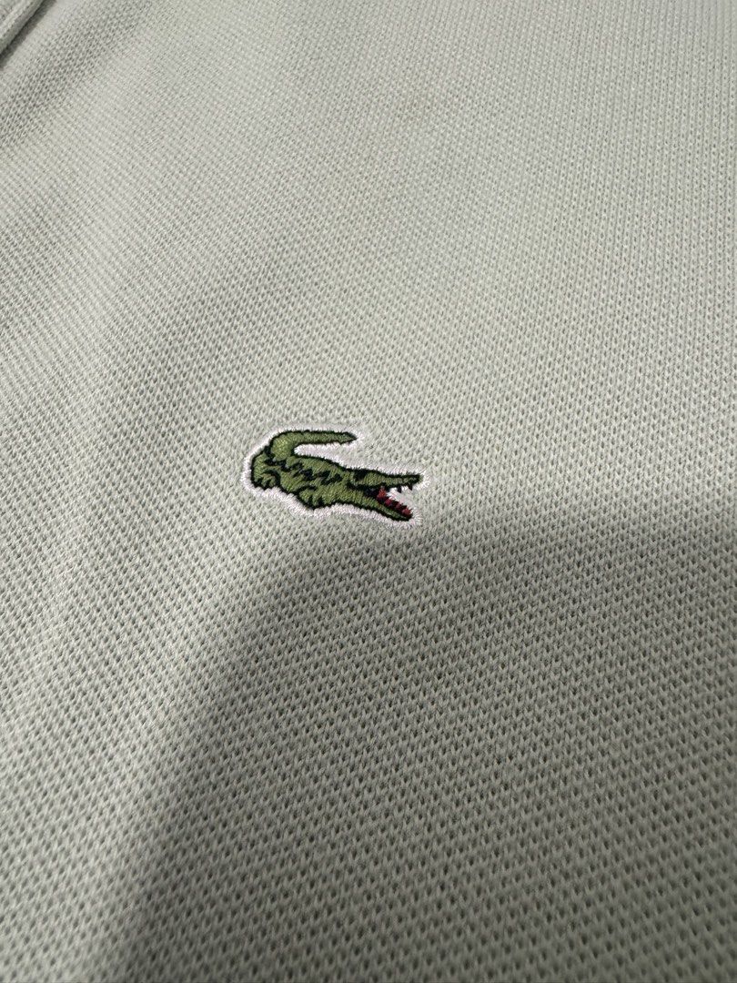 Authentic Lacoste Polo Shirt - Light Green - Size 36 (Category: Shirts) located in Imus. Submitted by oliviascents (Listing ID 1440888738, Image 3). Description: - Authentic light green Lacoste polo shirt - Iconic embroidered crocodile logo on chest - Button-up neckline - Size 36 - Ideal for casual wear W 15, L 25.