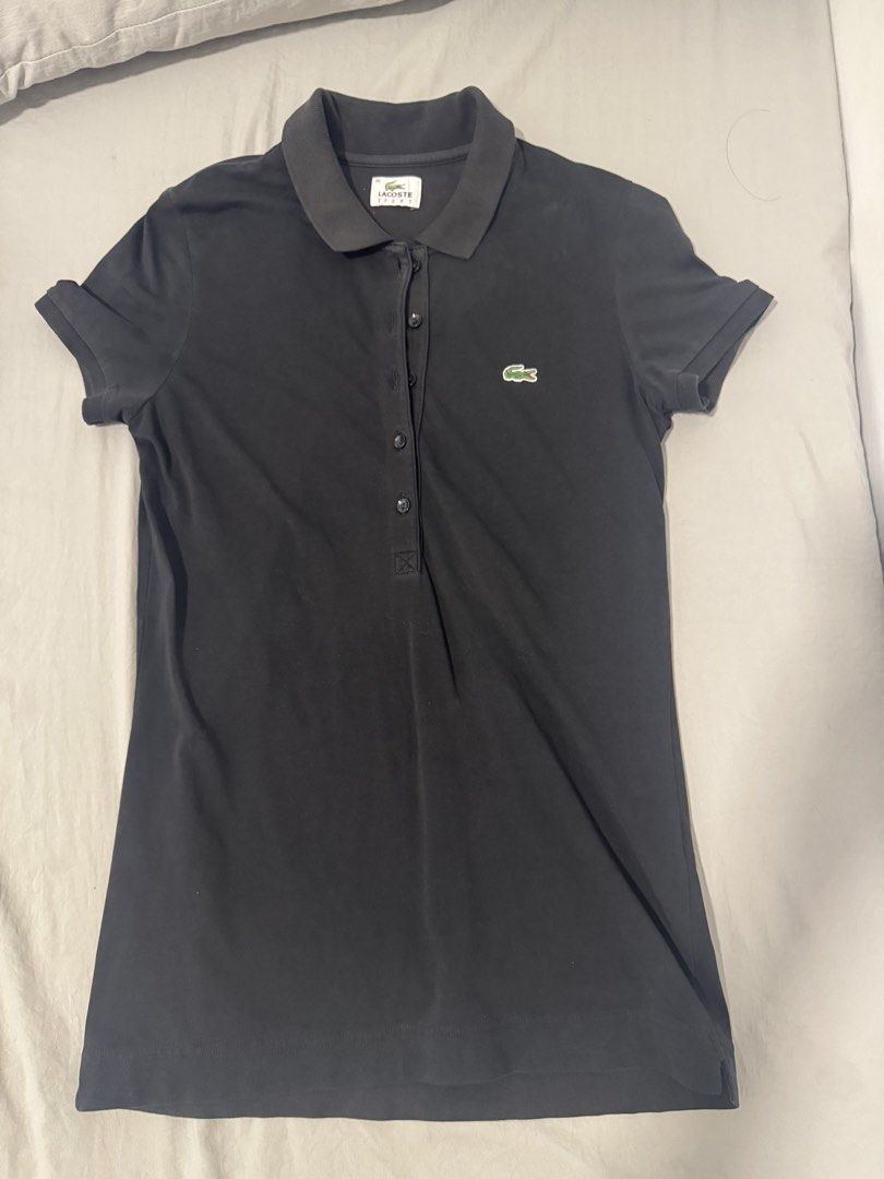 Authentic Lacoste Sport Black Polo Shirt (Category: Shirts) located in Imus. Submitted by oliviascents (Listing ID 1440888913, Image 1). Description: - Classic black Lacoste Sport polo shirt - Features iconic crocodile logo on chest - Button-up neckline with comfortable collar - Short sleeves - Ideal for casual wear or a sporty look W 15, L 25.