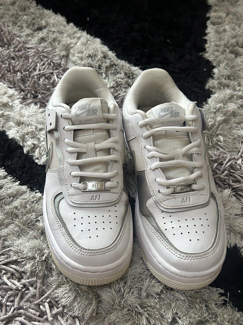 Authentic Nike Airforce 1 woman (Category: Sneakers) located in Cebu City. Submitted by vedazzle (Listing ID 1440900611, Image 2). Description: 📍Clean white and elephant gray colorway 📍Easy to pair with any outfit 📍Size: Us 6.5 📍 Sign of usage 📍 from 3k to 1500.