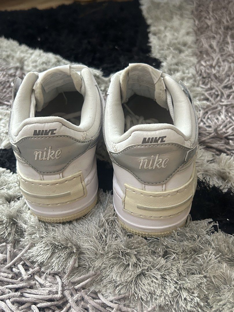 Authentic Nike Airforce 1 woman (Category: Sneakers) located in Cebu City. Submitted by vedazzle (Listing ID 1440900611, Image 3). Description: 📍Clean white and elephant gray colorway 📍Easy to pair with any outfit 📍Size: Us 6.5 📍 Sign of usage 📍 from 3k to 1500.