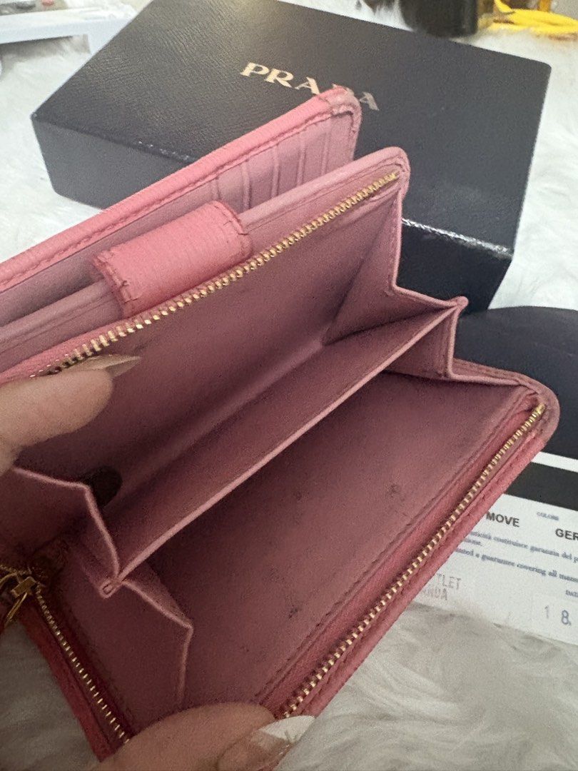 Authentic Prada (Category: Luxury Bags & Wallets) located in Quezon City. Submitted by preetycindz (Listing ID 1440801946, Image 3). Description: - Authentic Prada Wallet - Color: Geranio Pink - Material: Vitello Move Leather - Includes: Original Box, Authenticity Card - Closure: Zip Around - Features: Keeps essentials organized 100% authentic money back if proven fake sign of use only .