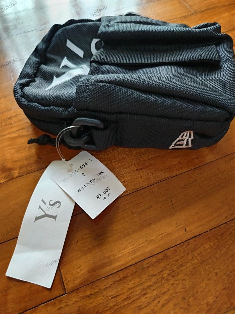 BAGS: ORIGINAL JAPAN YOHJI YAMAMOTO x NEW ERA Y'S SHOULDER BAG FOR SALE (Category: Sling Bags) located in Singapore. Submitted by golfsiao.travels. (Listing ID 1440910771, Image 3). Description: NOTE: 1) Pls read through and check out the pics closely. 2) No Return. No Refund. No Exchange. 3) When In Doubt, Pls Don't Buy. Reference Info: Price Tag indicated JPY9,000 (about SGD72). From Japan. Brand New with Tags and Labels. Official Colour: Black