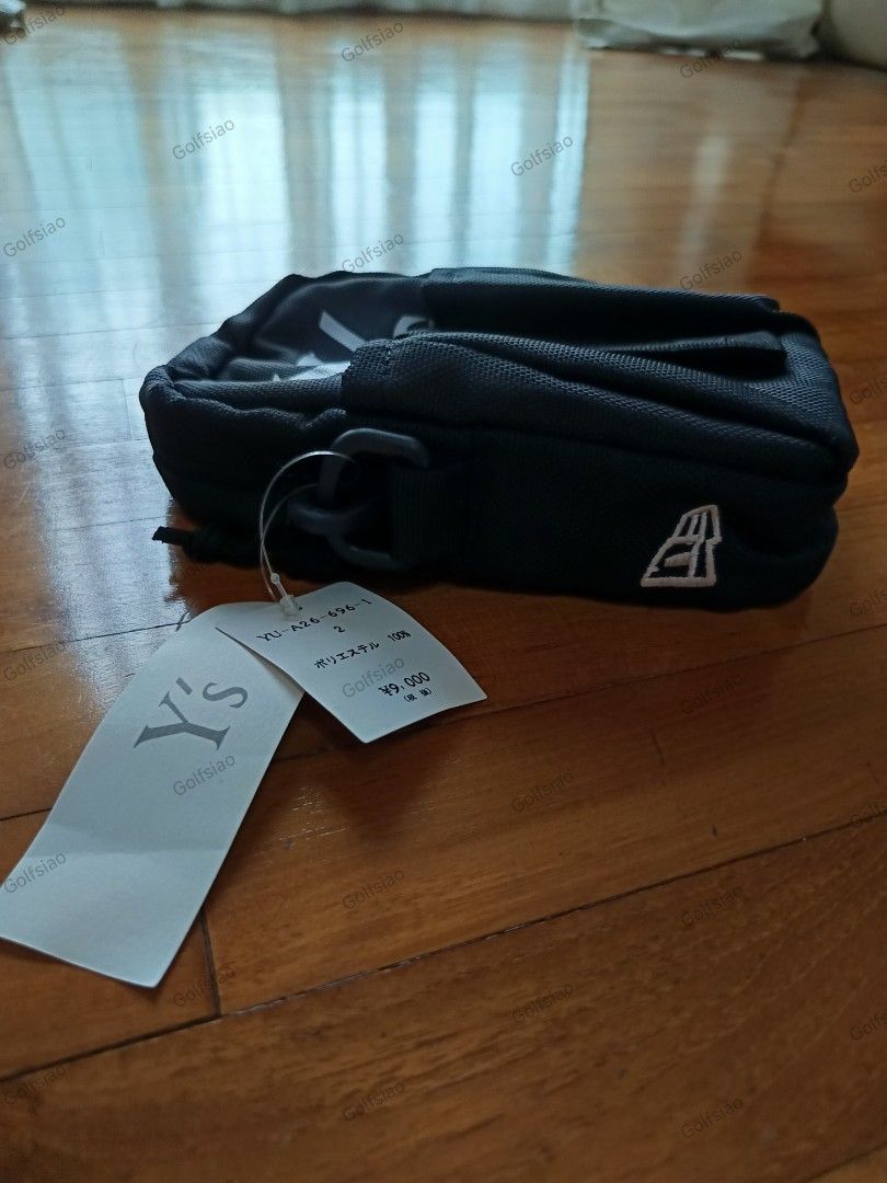 BAGS: ORIGINAL JAPAN YOHJI YAMAMOTO x NEW ERA Y'S SHOULDER BAG FOR SALE (Category: Sling Bags) located in Singapore. Submitted by golfsiao.travels. (Listing ID 1440910771, Image 2). Description: NOTE: 1) Pls read through and check out the pics closely. 2) No Return. No Refund. No Exchange. 3) When In Doubt, Pls Don't Buy. Reference Info: Price Tag indicated JPY9,000 (about SGD72). From Japan. Brand New with Tags and Labels. Official Colour: Black