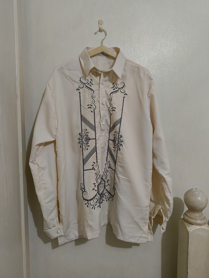 Beige Men's Office Barong (Category: Tshirts & Polo Shirts ) located in Quezon City. Submitted by afteruse (Listing ID 1440893358, Image 1). Description: - Bought at House of Barong in Tutuban - Originally planning an androgynous look with this; di bumagay lol - Never worn just stuck in storage.