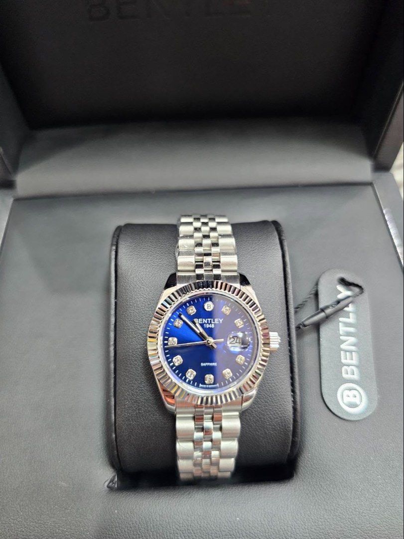 Bentley 1948 Sapphire Blue Dial Watch (Category: Luxury Watches) located in Manila. Submitted by shellador82390 (Listing ID 1440784562, Image 1). Description: - Bentley 1948 Watch - Stunning Sapphire Blue Dial - Elegant Diamond Hour Markers - Convenient Date Window - Durable Stainless Steel Band and Case - Includes Original Box - A Timeless Classic.
