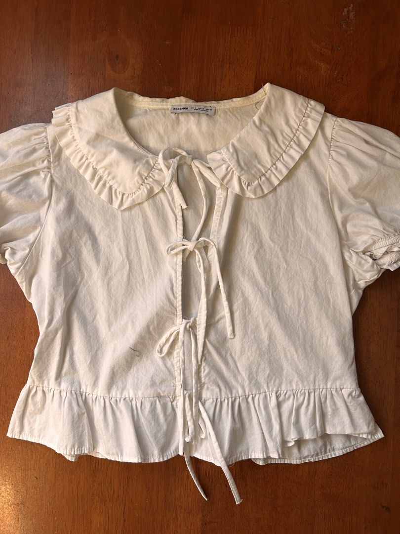 Bershka White Ribbon Top (Category: Blouses) located in Manila. Submitted by by.drea (Listing ID 1440832954, Image 2). Description: rfs: need space and closet decluttering will keep if no one gets it than lower the price - only worn once - high quality fabric - flaw yellowish near the tag but unnoticeable when worn - so pretty in pictures - originally bought this in bershka around 1.2k+ - good for small too .