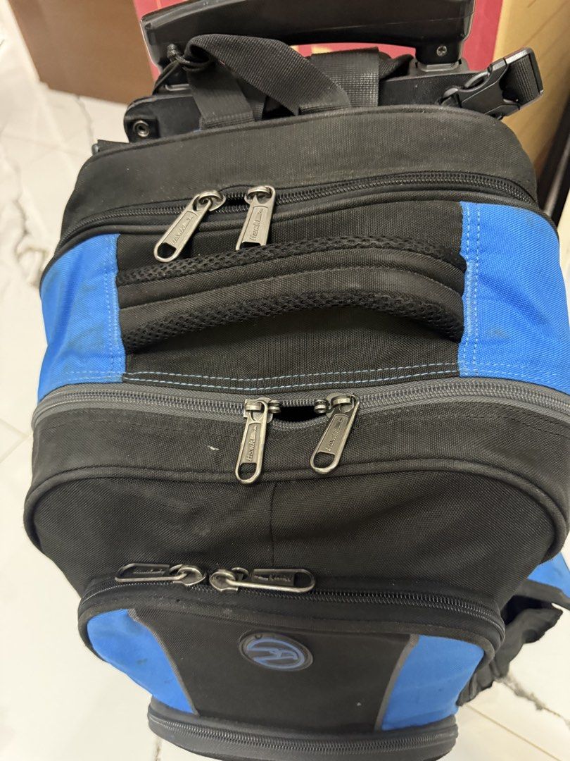 Black and Blue Rolling Backpack with Telescopic Handle (Category: Backpacks) located in Quezon City. Submitted by lucialove (Listing ID 1440917243, Image 3). Description: - Hawk 5595 Large Backpack Stroller With Virupro Anti-Microbial Protection Black and blue rolling backpack - Telescopic handle for easy transport - Multiple zippered compartments for organization - Side mesh pockets - Minor scuffs and a small tear on one mesh pocket - Still full