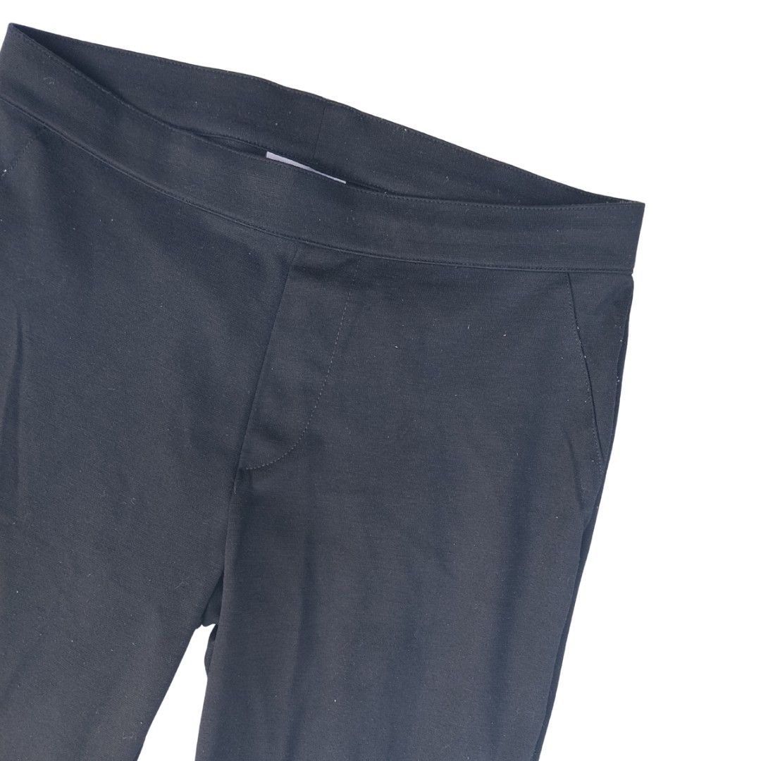 Black Elastic Waist Pants | Medium (Category: Other Bottoms) located in Manila. Submitted by ubes_corner (Listing ID 1440939456, Image 2). Description: - Black pants with elastic waistband - Straight leg cut - Comfortable for everyday wear - Size: Medium (M) - Material: Polyester and Spandex blend - Easy pull-on style - Ideal for casual outings or lounging at home.