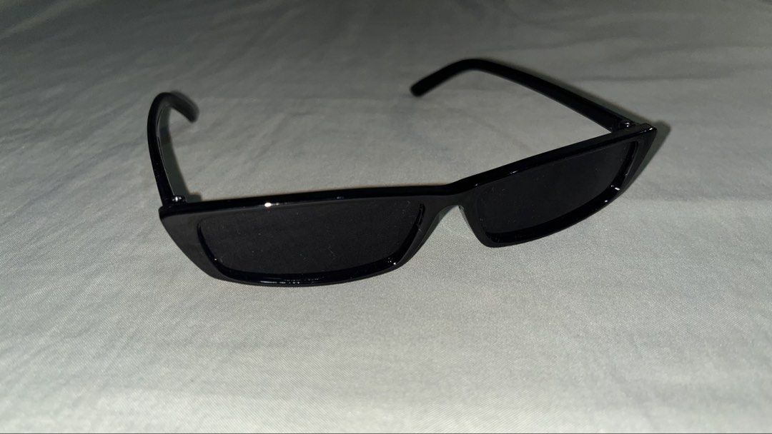 Black Rectangular Cat Eye Sunglasses (Category: Sunglasses & Eyewear) located in Makati City. Submitted by madwear___ (Listing ID 1440944789, Image 2). Description: 🌀 10/10 condition; no issues 🪷 modes of payment: gcash, maya, chinabank, and unionbank :) 🍀 shipping fee must be paid by buyer; same day delivery is possible 💠 color may vary due to lighting ‼️get all sunglasses for 800 pesos send a message for inquires! 🪄💌.