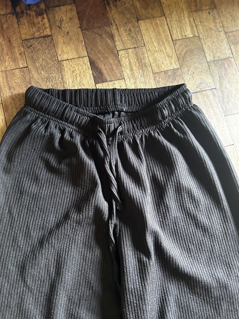 Black Ribbed Wide Leg Pants with Drawstring Waist (Category: Other Bottoms) located in Manila. Submitted by d.artchives (Listing ID 1440783827, Image 2). Description: - Black ribbed fabric - Wide leg cut - Elastic waistband with drawstring - Raw hem detail - Comfortable and casual for everyday wear.