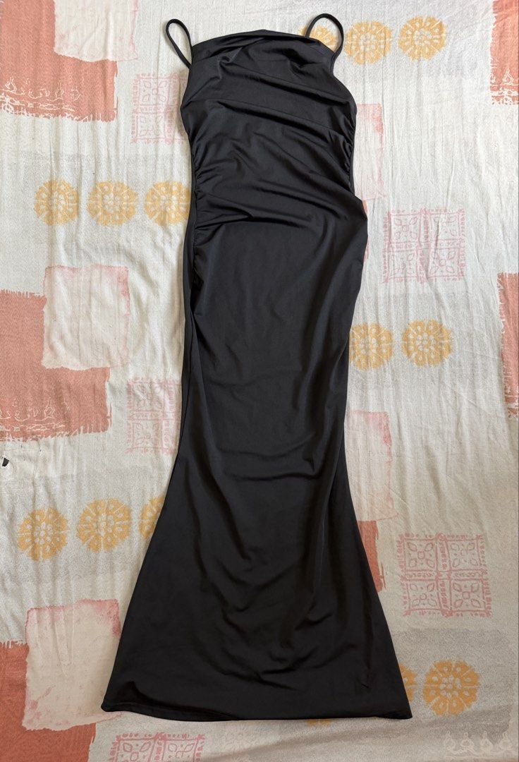 Black Ruched Maxi Dress Spaghetti Straps (Category: Dresses) located in Manila. Submitted by chiechums (Listing ID 1440770343, Image 1). Description: - Long black dress - Spaghetti straps - Side ruching detail - Floor length with a slight flare - Material with a nice sheen - Ideal for formal events or a night out.