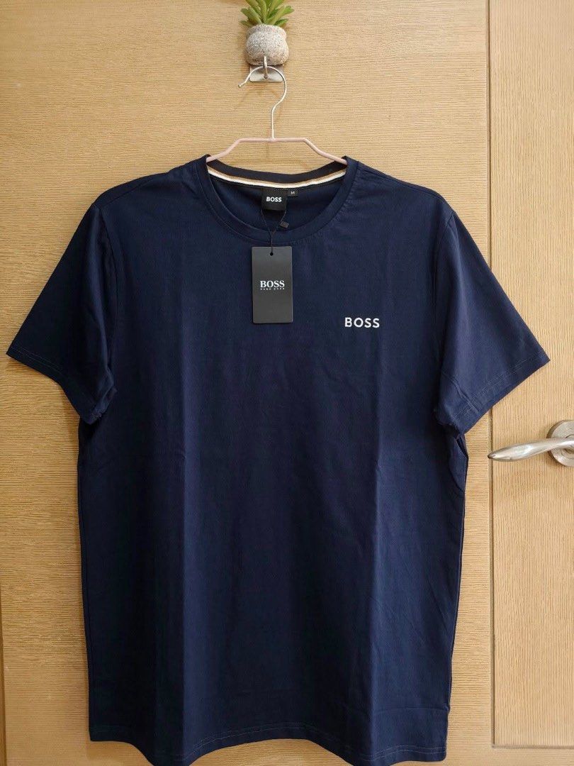 BOSS Navy Blue T-Shirt with Logo (Category: Tshirts & Polo Shirts ) located in Manila. Submitted by peachesc (Listing ID 1440770973, Image 1). Description: Available Sizes: Medium - 21 W x 28.5 L (Can fit to Large frame) Inclusion: Hang Tag and Hugo Boss Resealable Plastic More pictures will be provided upon request via Chat. Feel free to send a message. Thanks!.