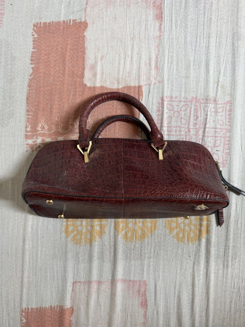 Brown Croc Embossed Leather Handbag (Category: Luxury Bags & Wallets) located in Manila. Submitted by chiechums (Listing ID 1440795701, Image 1). Description: - Classic brown leather handbag - Stylish croc embossing - Comfortable top handles - Secure zip closure - Gold-tone hardware accents - Multiple interior compartments - Interior zippered pocket - Ideal for everyday style.