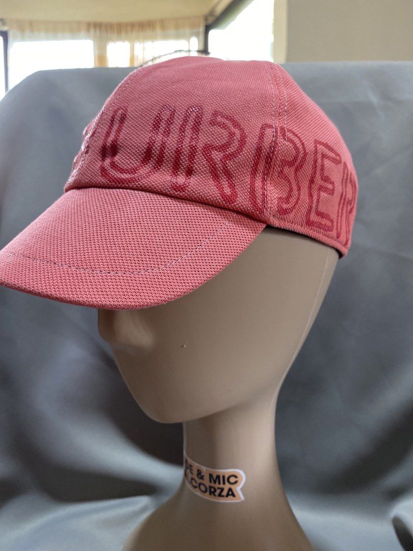 Burberry Pink Logo Baseball Cap Kids (Category: Caps & Hats) located in Tanay. Submitted by judevalcorza (Listing ID 1440827328, Image 2). Description: - Authentic Pink Burberry Baseball Cap - Features embossed Burberry logo on the front - Classic baseball cap design - Iconic Burberry check pattern on the inside lining - Adjustable strap at the back for a custom fit - A stylish accessory to elevate any outfit - Signs Of Used sa strap - Still In V