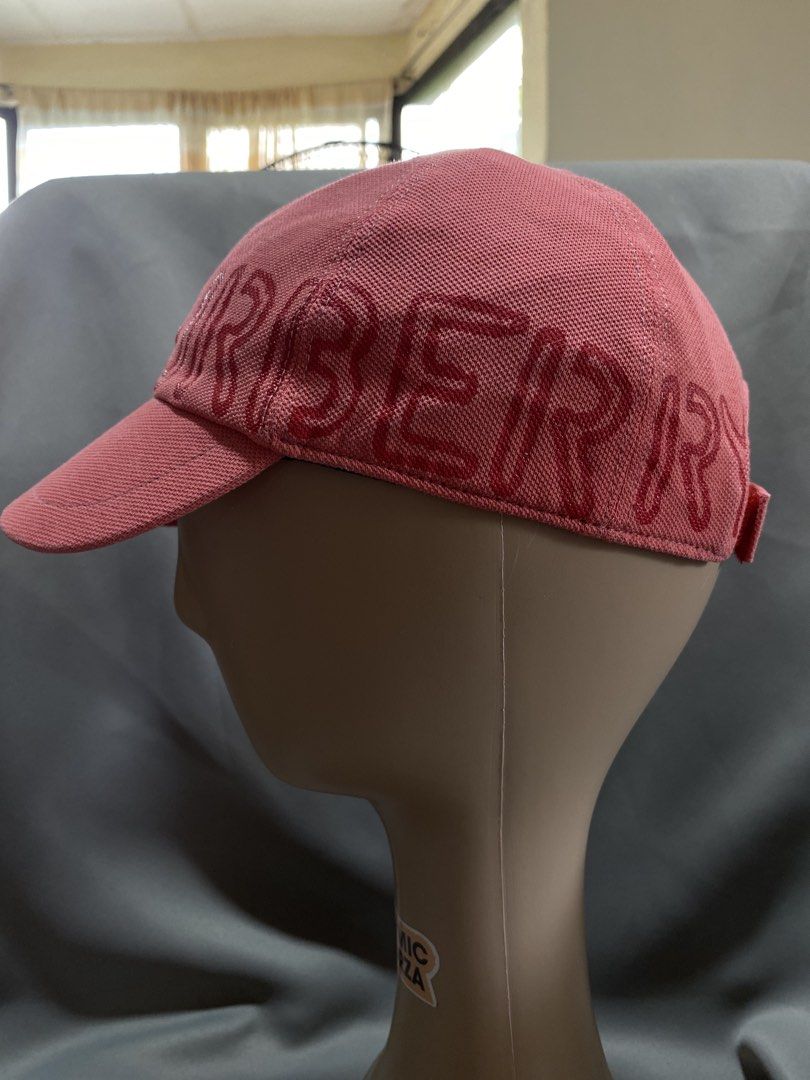 Burberry Pink Logo Baseball Cap Kids (Category: Caps & Hats) located in Tanay. Submitted by judevalcorza (Listing ID 1440827328, Image 3). Description: - Authentic Pink Burberry Baseball Cap - Features embossed Burberry logo on the front - Classic baseball cap design - Iconic Burberry check pattern on the inside lining - Adjustable strap at the back for a custom fit - A stylish accessory to elevate any outfit - Signs Of Used sa strap - Still In V