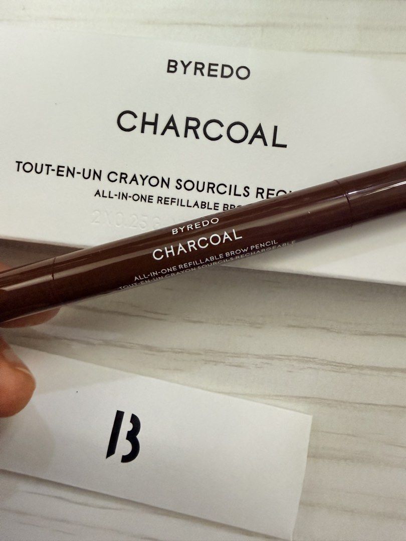 BYREDO Charcoal All-In-One Refillable Brow Pencil (Category: Makeup) located in Muntinlupa City. Submitted by thediviners (Listing ID 1440865420, Image 2). Description: - BYREDO Charcoal Brow Pencil - All-in-one refillable design - Includes original packaging and small card - Ideal for defining brows - Easy to use and apply.