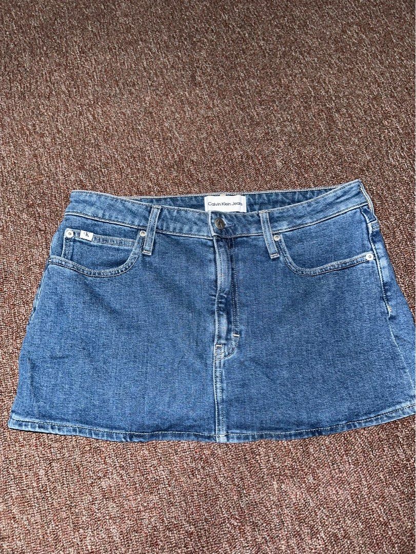 Calvin Klein Jeans Micro Mini Denim Skirt (Category: Skirts) located in Angeles City. Submitted by sageandolive (Listing ID 1440945536, Image 1). Description: - blue denim skirt from Calvin Klein Jeans - CK logo detail on front pocket and back waistband - bought for ₱7,250 - never worn, just tried (no longer comes with tag).