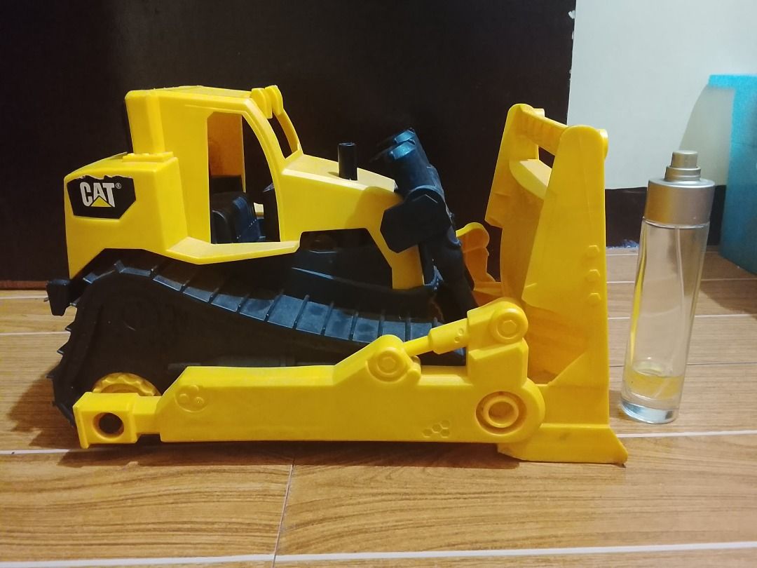 CAT and other toy construction vehicles set (Category: Kids Toys) located in Quezon City. Submitted by gracieloves09 (Listing ID 1440949322, Image 2). Description: Please help me declutter my youngest son's toys. In Good condition po lahat unless stated otherwise. Small Fire Truck 300 Big Fire Truck (gray ladder) 500 Giant Fire Truck (with yellow ladder) 1K CAT big bulldozer 500 CAT small construction vehicles 1200 (all three) Colorful dumper/fro