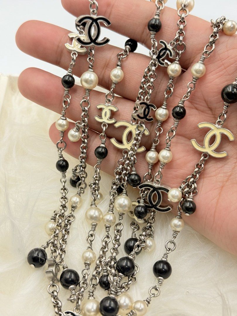 CHANEL B11C Necklace (Category: Luxury Accessories) located in Baguio. Submitted by manang_isang (Listing ID 1440905929, Image 2). Description: Chanel B11C Necklace features an iconic CC logo and a beautiful combination of black and white costume pearls. Originating from the 2011 Cruise Collection, this piece mixes vintage-style pearls with signature Chanel branding, making it a highly sought-after collector’s.