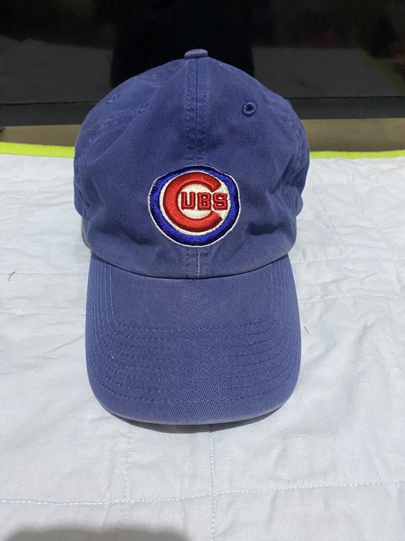 SALE! Chicago Cubs Baseball Cap Blue Embroidered Logo (Category: Caps & Hats) located in Manila. Submitted by resi.diaz (Listing ID 1440934194, Image 1). Description: - some fading on the seams as shown in photos. - Blue baseball cap - Features embroidered Chicago Cubs logo on front - 'Chicago Cubs' embroidered on the side - Classic dad hat style - Great for any Cubs fan - Shows some signs of wear, but still in good shape.