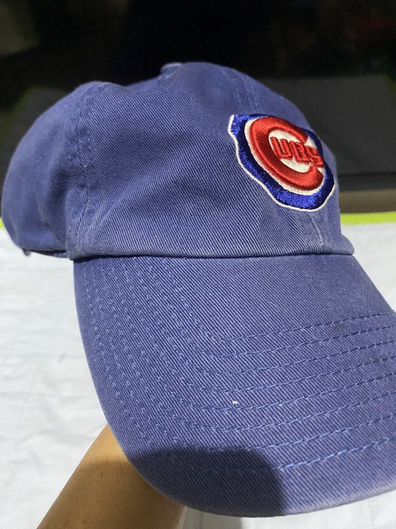 SALE! Chicago Cubs Baseball Cap Blue Embroidered Logo (Category: Caps & Hats) located in Manila. Submitted by resi.diaz (Listing ID 1440934194, Image 3). Description: - some fading on the seams as shown in photos. - Blue baseball cap - Features embroidered Chicago Cubs logo on front - 'Chicago Cubs' embroidered on the side - Classic dad hat style - Great for any Cubs fan - Shows some signs of wear, but still in good shape.