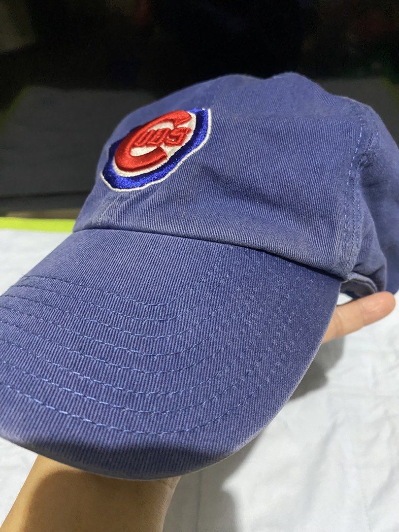 SALE! Chicago Cubs Baseball Cap Blue Embroidered Logo (Category: Caps & Hats) located in Manila. Submitted by resi.diaz (Listing ID 1440934194, Image 2). Description: - some fading on the seams as shown in photos. - Blue baseball cap - Features embroidered Chicago Cubs logo on front - 'Chicago Cubs' embroidered on the side - Classic dad hat style - Great for any Cubs fan - Shows some signs of wear, but still in good shape.