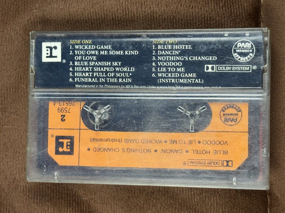 Chris Isaak Wicked Game Cassette Tape (Category: CDs & DVDs) located in San Juan City. Submitted by redgecollection (Listing ID 1440759250, Image 2). Description: - Chris Isaak's Wicked Game cassette tape - Includes Side One and Side Two tracks - Manufactured in the Philippines - Features Dolby System - Perfect addition to any music collection.
