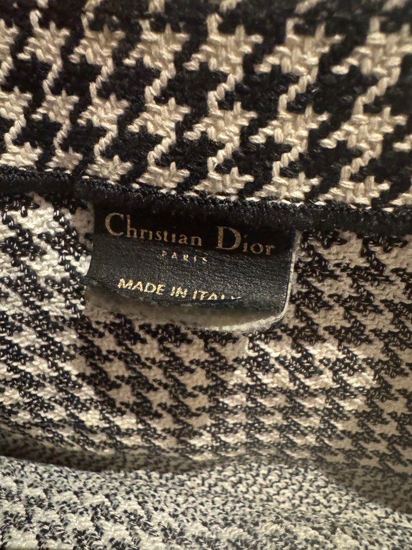 Christian Dior Houndstooth Book Tote Bag (Category: Luxury Bags & Wallets) located in Quezon City. Submitted by annsapp (Listing ID 1440871222, Image 3). Description: - Authentic Christian Dior tote bag - Classic houndstooth pattern - Features Christian Dior Paris logo on the front - Made in Italy - Purchased in Europe - Spacious interior - Ideal for everyday use or travel RFS: Too many bags.