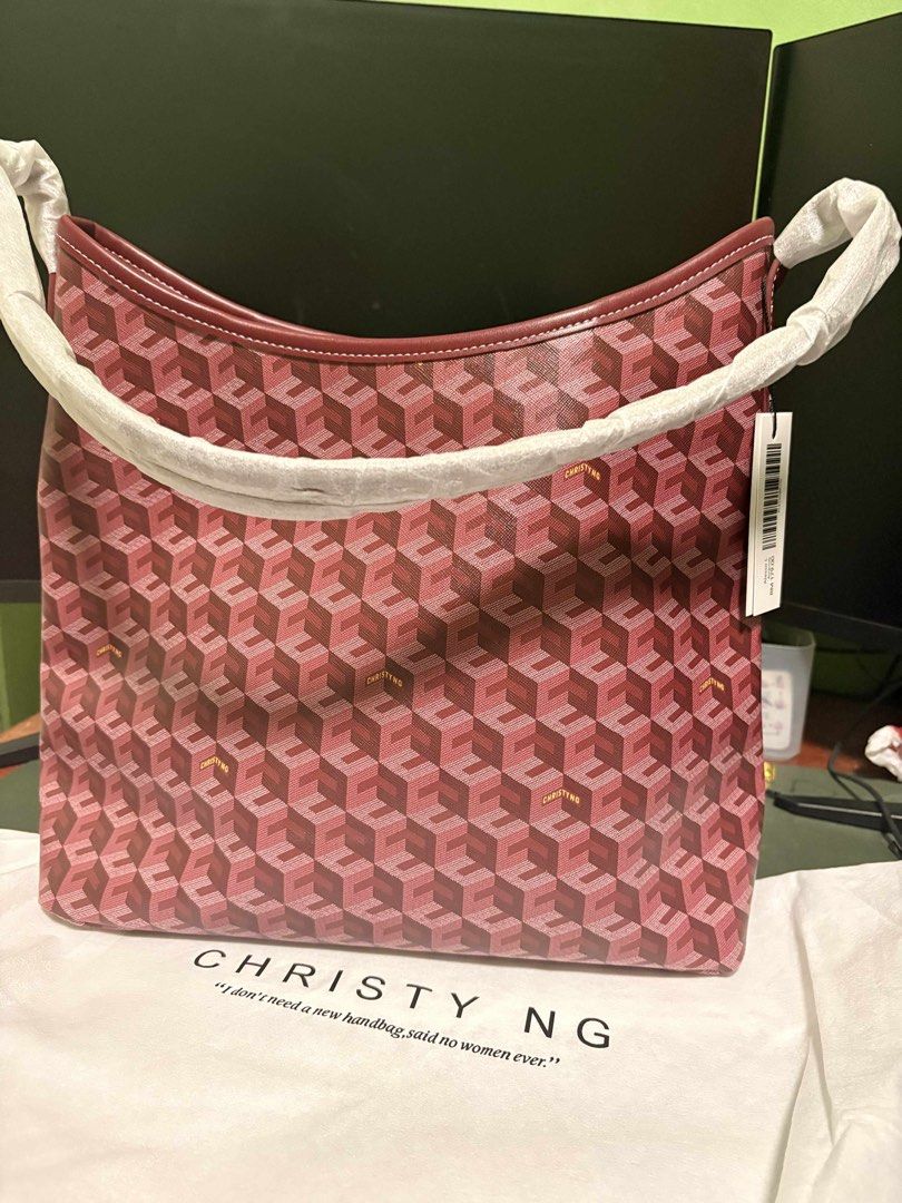Christy Ng Alesso Hobo Bag (Category: Tote Bags) located in Lipa City. Submitted by issaaawwww (Listing ID 1440945904, Image 1). Description: - Brand: Christy Ng - Style: Hobo Bag - Color: Burgundy - Includes: Dust bag - Ideal for: Everyday use Original. Bought in Christy Ng Malaysia.