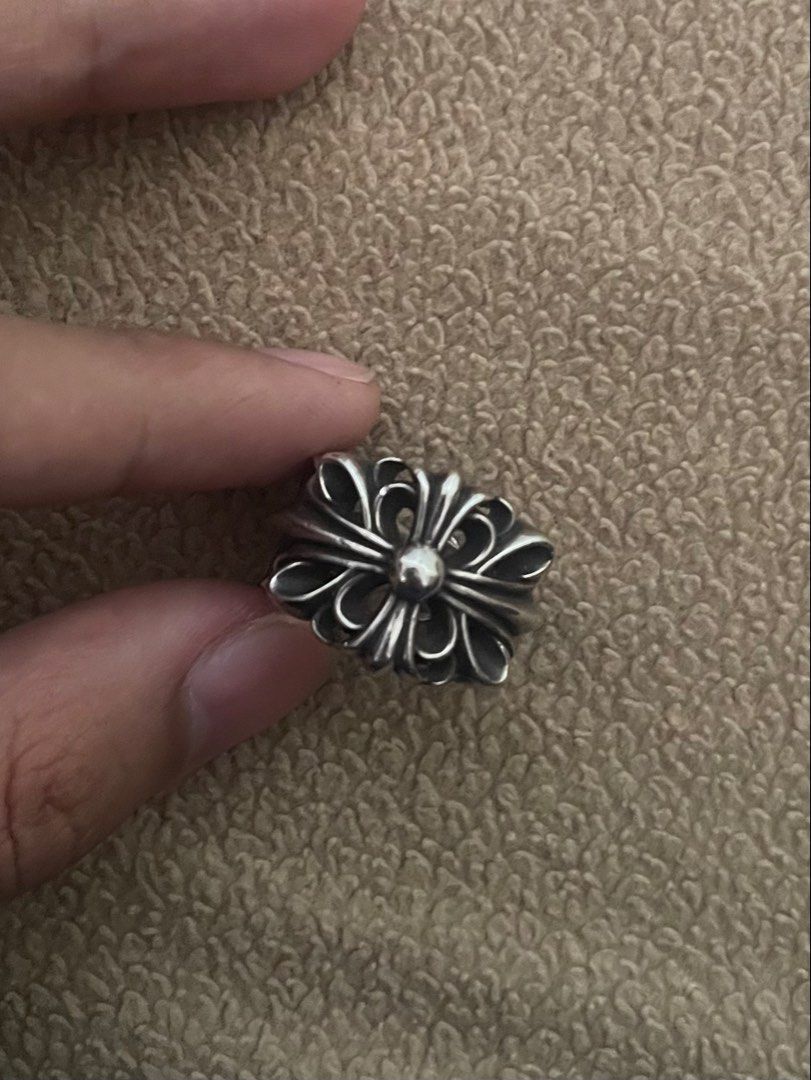 Chrome Hearts Double Floral Ring (Category: Announcements) located in Caloocan City. Submitted by keanrileym55340 (Listing ID 1440919667, Image 1). Description: - Chrome Hearts ring - Material: Sterling Silver (925) - Design: Iconic double floral cross - Engravings: 'Chrome Hearts' and '925' - Condition: Great - size 7 Pasig Loc .