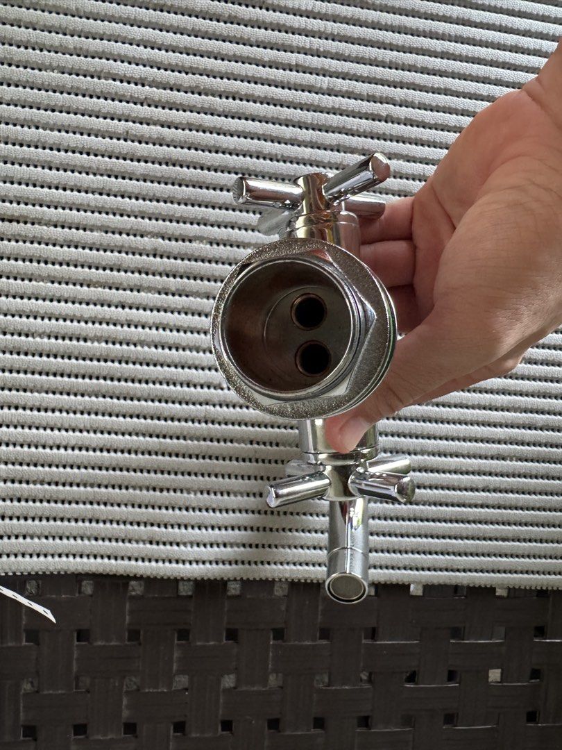 Chrome Kitchen Faucet with Double Cross Handles (Category: Bathroom & Kitchen Fixtures) located in Bacolod City. Submitted by swagspot (Listing ID 1440855186, Image 3). Description: - Sleek chrome finish - Dual cross handles for easy control - Swivel spout for added convenience - Standard top fitting, ready for installation - Ideal for kitchen sinks or utility areas - Clean and shiny appearance.