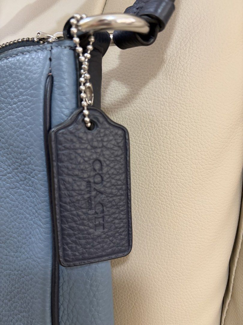 Coach crossbody bag (Category: Luxury Bags & Wallets) located in Makati City. Submitted by eda.geee (Listing ID 1440763267, Image 3). Description: Coach retail Crossbody bag Rarely used Sells for 18k to 22k Selling for 5k Greenbelt meetup J&t delivery.