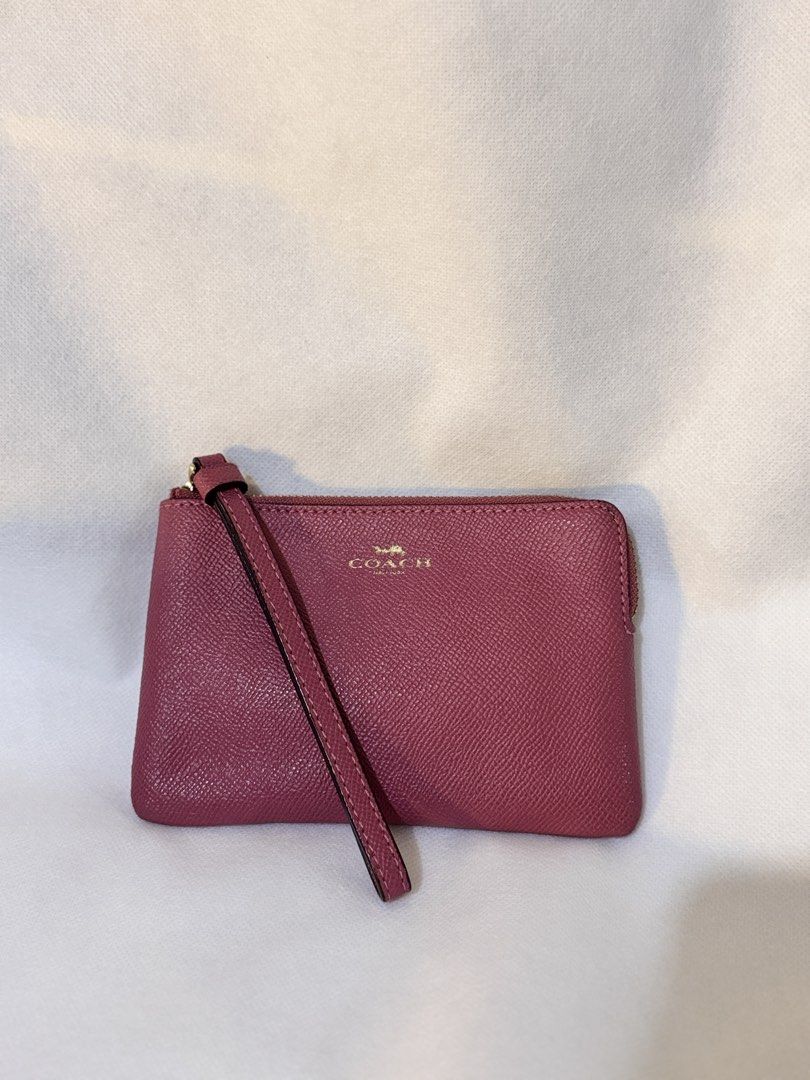 Coach Pink Leather Wristlet Pouch with Strap (Category: Purses & Pouches) located in Davao. Submitted by stellietas (Listing ID 1440858685, Image 3). Description: ✨Good condition, minimal signs of use only. Clean interior. ✨Size: 6.25L x 4.25W inches ✨First to pay gets it. ✨💯 % original or money back ✨Japan preloved.