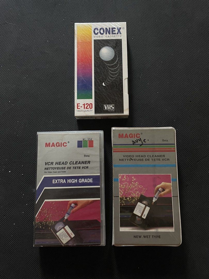 CONEX E-120 VHS Tape & MAGIC Beta VCR Head Cleaners (Category: CDs & DVDs) located in Manila. Submitted by elsy_disco (Listing ID 1440933902, Image 1). Description: - CONEX E-120 VHS video cassette - MAGIC Beta VCR head cleaner tape (Extra High Grade, Wet Type) - MAGIC Beta VCR head cleaner tape (New, Wet Type) - All items are in their original packaging - Perfect for VCR maintenance and upkeep - Sold as set.