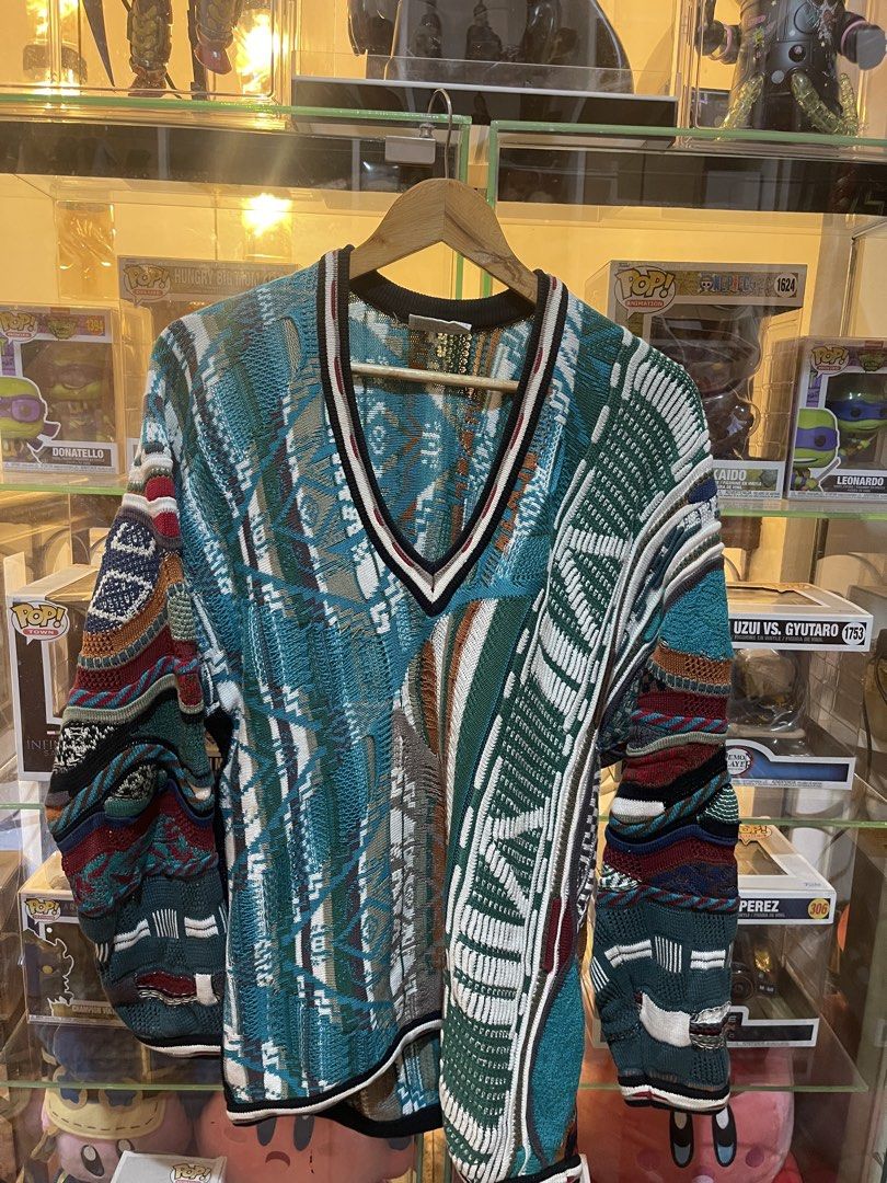 Coogi Australia Cardigan (Category: Activewear) located in Manila. Submitted by weart (Listing ID 1440793602, Image 1). Description: Size: Medium but fitted Large or Upper Width: 22 Length: 30 Issues: None.
