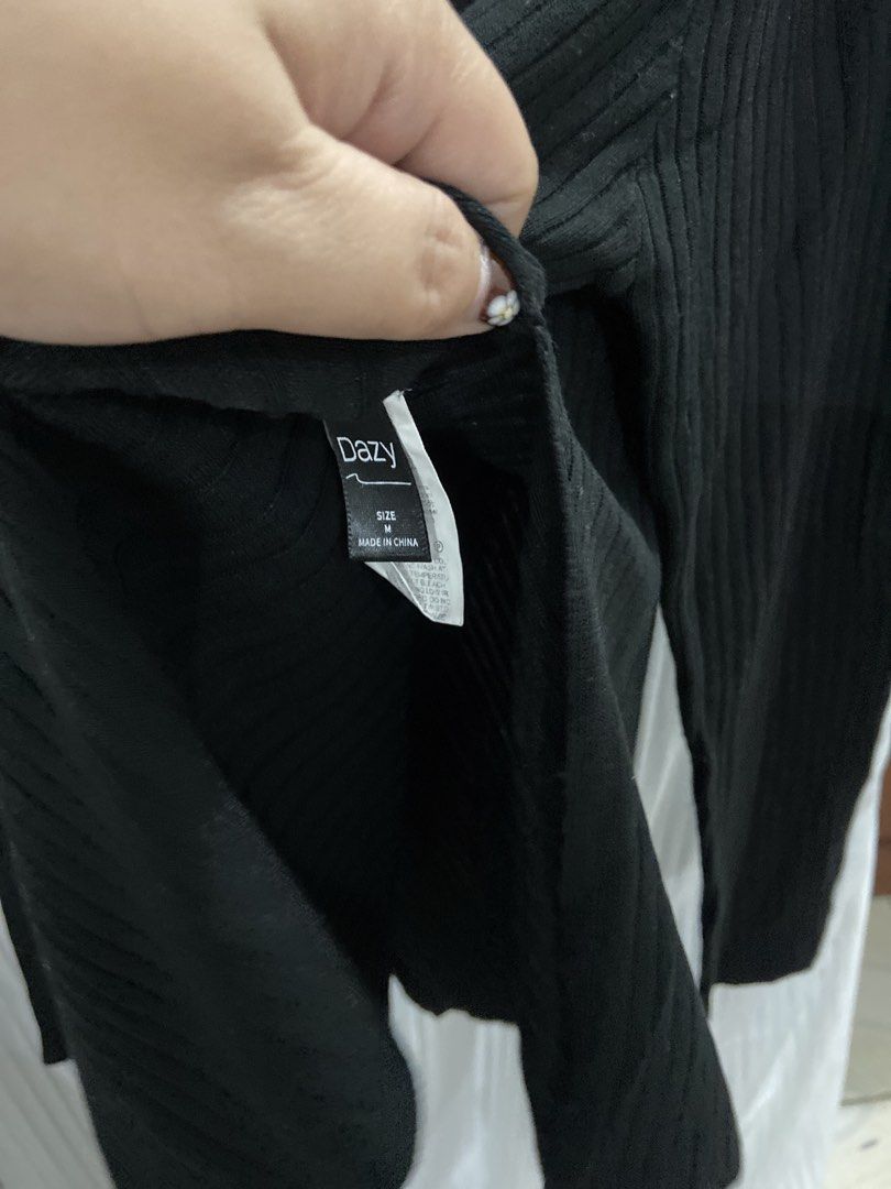 Dazy Black Ribbed Long Sleeve Top Size M (Category: Longsleeves) located in Quezon City. Submitted by markupapparel (Listing ID 1440851011, Image 2). Description: - Brand: Dazy - Color: Black - Style: Ribbed long-sleeved top - Size: Medium (M) - Fit: Relaxed with a slightly flared hem - Versatility: Ideal for everyday wear, easily pairs with jeans or skirts, and suitable for layering..