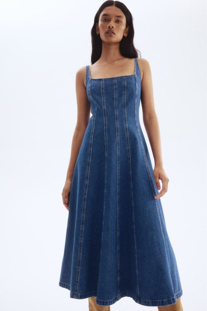 Denim Midi Dress with Cut-out Sides (Category: Dresses) located in Manila. Submitted by fiercefish.b07a25 (Listing ID 1440947639, Image 2). Description: - Blue vintage denim midi dress - Square neckline with wide straps - Stylish side cut-out details - Comfortable elasticated waist _ with two side pockets - Convenient back zipper closure - Ideal for casual outings and everyday wear MEASUREMENTS: BUST 32 TO 34 INCHES WAIST 26 TO 28 INCHES LENGTH 4