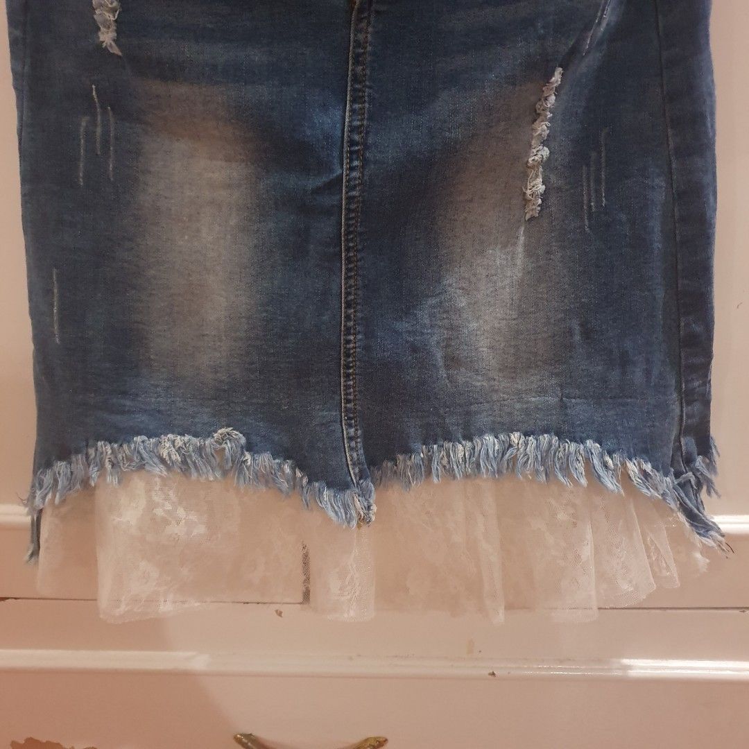 Denim Skirt with Lace Trim (Category: Skirts) located in Angeles City. Submitted by malijeu94 (Listing ID 1440761940, Image 2). Description: Size: Small (Can fit Medium) Type: Denim Skirt with Lace Trim Price: Php 220.00 + Shipping Fee + Handling Fee RFS: Decluttering my closet **BUNDLE PROMO: BUY 3 ITEMS FROM THIS SHOP, GET 1 RANDOM ITEM FOR FREE**.