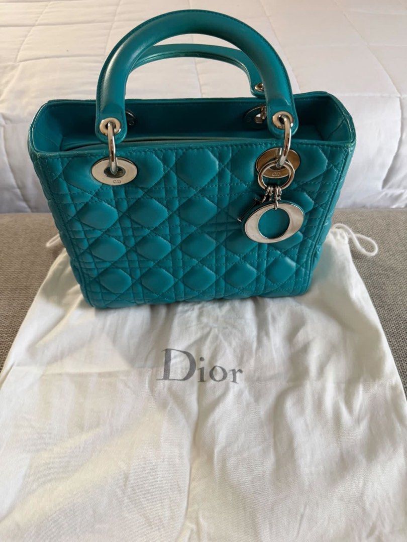 Dior Lady Dior Turquoise Leather Handbag (Category: Luxury Bags & Wallets) located in Santa Rosa. Submitted by minerva416 (Listing ID 1440822987, Image 1). Description: - Authentic Dior Lady Dior handbag - Beautiful turquoise color - Made from quilted leather - Comes with original dust bag - Classic and versatile piece for any occasion W/ card, dust bag and box Slightly negotiable. Send your bids. .