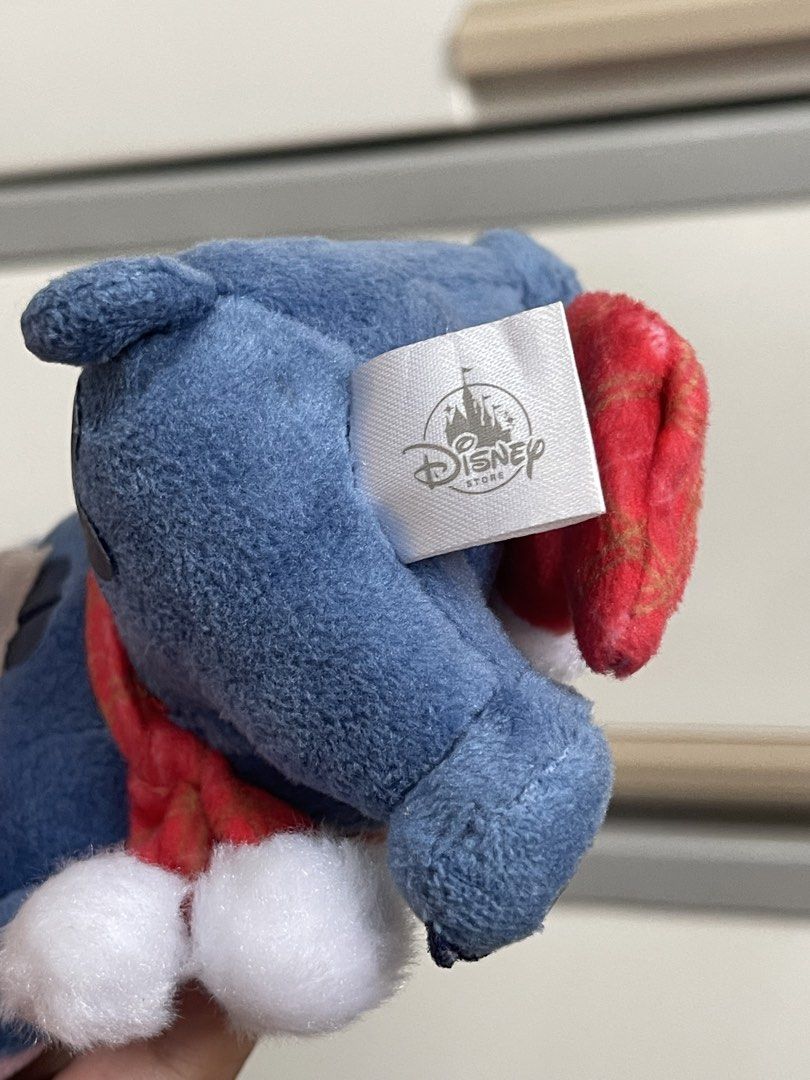 Disney Store Stitch Christmas Plush Keychain (Category: Plushies & Soft Toys) located in Arayat. Submitted by imeon13 (Listing ID 1440935183, Image 3). Description: - Adorable Stitch plush keychain from Disney Store. - Festive Christmas design: includes Santa hat and scarf. - Features a cute stocking detail. - Ideal for decorating bags, backpacks, or as a holiday accessory. - A must-have for any Stitch enthusiast!.