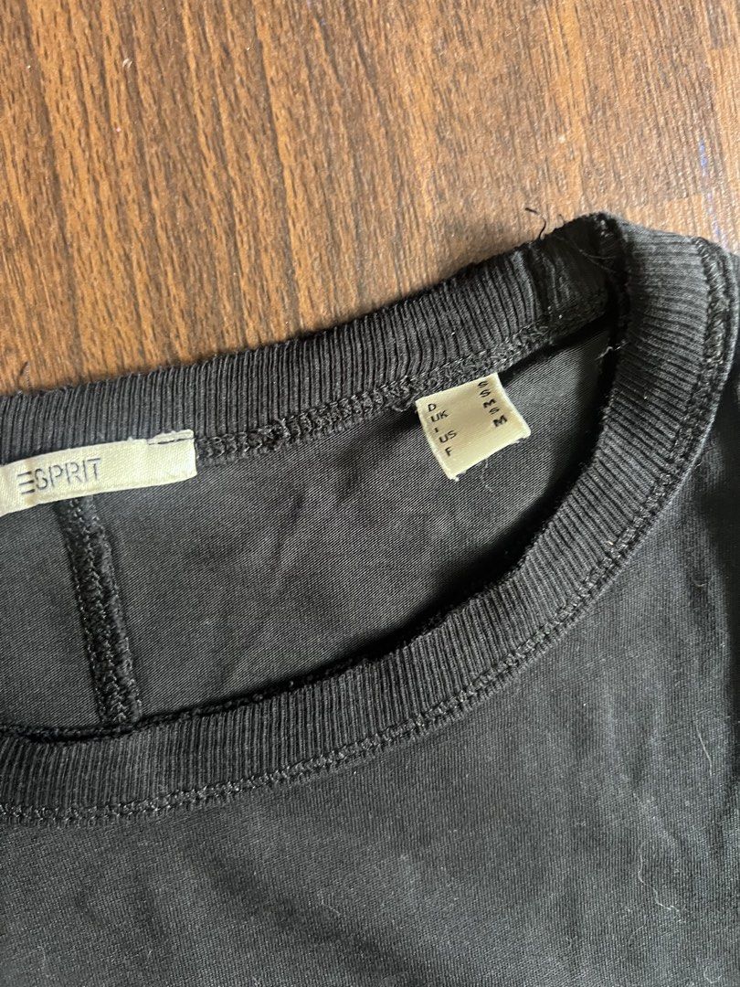 Esprit Black Distressed T-Shirt (Category: Shirts) located in Antipolo. Submitted by riesns (Listing ID 1440793990, Image 3). Description: - Brand: Esprit - Color: Black - Style: Basic T-shirt - Features: Short sleeves, crew neck - Versatility: Easy to pair with any outfit - Occasion: Everyday wear.