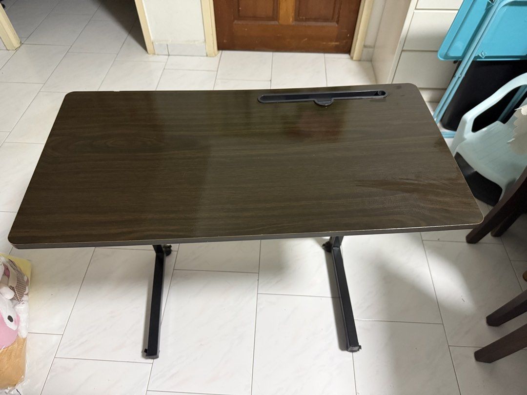 Foldable Table (Category: Tables & Sets) located in Singapore. Submitted by zapdeals_sg (Listing ID 1440886090, Image 1). Description: 低价出售几张可调节电脑桌，有意者联系王小姐91897482.