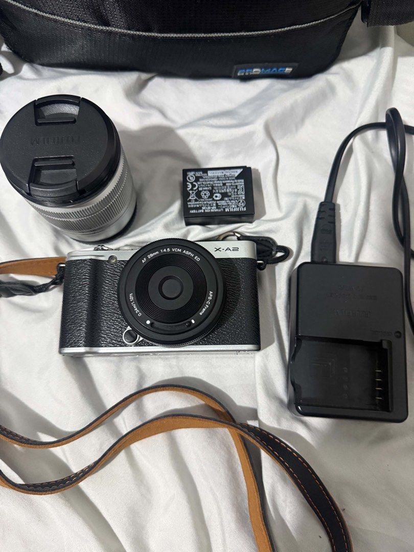 Fujifilm X-A2 Mirrorless Camera (Category: Cameras) located in Lipa City. Submitted by 6_feet_under (Listing ID 1440837668, Image 2). Description: Fujifilm X-A2 Mirrorless Inclusions: Kitlens 16-50mm Battery Strap Charger Viltrox 28 mm Af Good Condition.