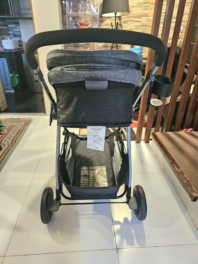 Evenflo Baby Stroller (Grey) (Category: Strollers) located in San Mateo. Submitted by authenticitemshere (Listing ID 1440773482, Image 3). Description: Bought in Canada. Used for a month only. RFS: nakastock lang. Mas preferred ni baby na nakasit lang. - Grey stroller with canopy - Adjustable handle for comfort - Spacious storage basket underneath - Secure 5-point safety harness - Convenient side cup holder - Ideal for daily walks and trips.
