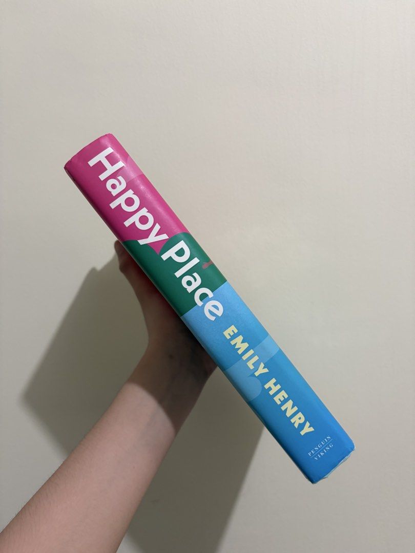 Happy Place by Emily Henry Hardbound (Category: Storybooks) located in San Juan. Submitted by laurice4 (Listing ID 1440855855, Image 2). Description: - Title: Happy Place - Author: Emily Henry - Format: Paperback - Genre: Romance - Plot: Follows two exes on a holiday that might change everything. - Endorsements: Praised by Taylor Jenkins Reid and Colleen Hoover. - Status: Popular and highly sought-after read. -Tanned edges -Hardbound cover -VGC P