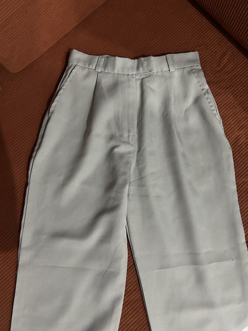 High Waisted Wide Leg Trousers (Category: Other Bottoms) located in Binan City. Submitted by wornbygwen (Listing ID 1440878628, Image 1). Description: - High-waisted design for a flattering silhouette - Trendy wide leg cut - Versatile neutral taupe/light grey color - Elegant front pleats - Convenient side pockets - Ideal for both casual outings and professional settings.