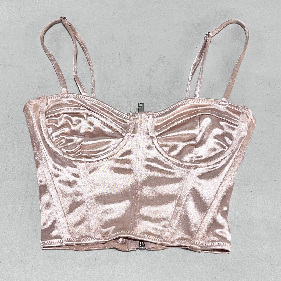 H&M Divided Satin Corset Top with Zipper Front (Category: Others Tops) located in Manila. Submitted by dmplng (Listing ID 1440827799, Image 1). Description: - Satin corset top - Front zipper closure - Adjustable straps - Slight sheen fabric - Versatile for pairing with jeans or skirts - Ideal for a night out.