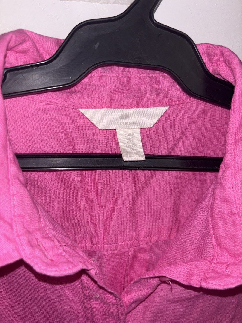 H&M Linen Blend Pink Button-Up Shirt (Category: Shirts) located in General Trias. Submitted by r_bimil (Listing ID 1440950533, Image 2). Description: - Pink linen blend shirt from H&M - Long sleeves with button cuffs - Single chest pocket - Relaxed fit, ideal for casual wear - Versatile for dressing up or down - Button-up front.